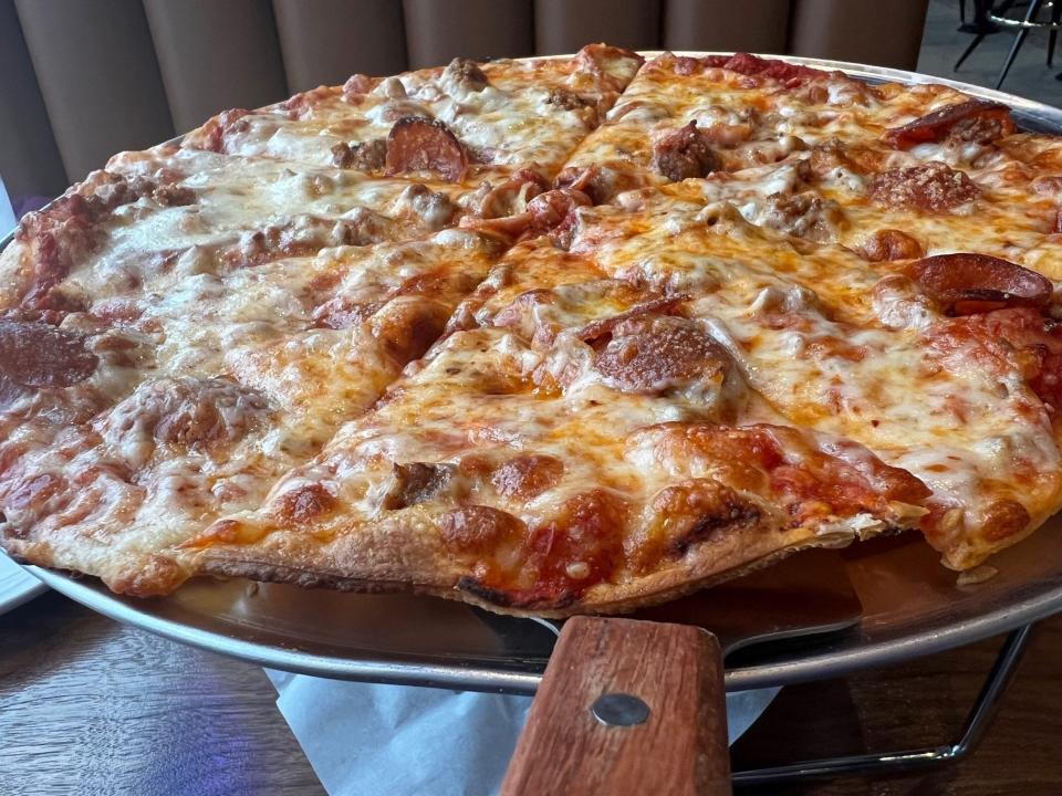 The Southsider pizza at Bix & Co. comes with pepperoni, Grazano's sausage, jalapeno peppers, banana peppers, red chili flakes and mozzarella.