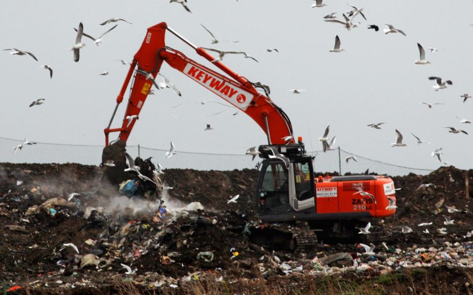 A landfill site in Gloucester. Around £2bn of surplus products are wasted every year by companies which could be donated to charities. - Getty Images Europe