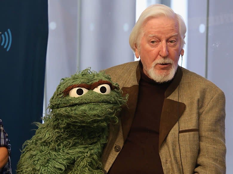 Sesame Street puppeteer Caroll Spinney, with Oscar the Grouch, in 2014: Robin Marchant/Getty Images for SiriusXM