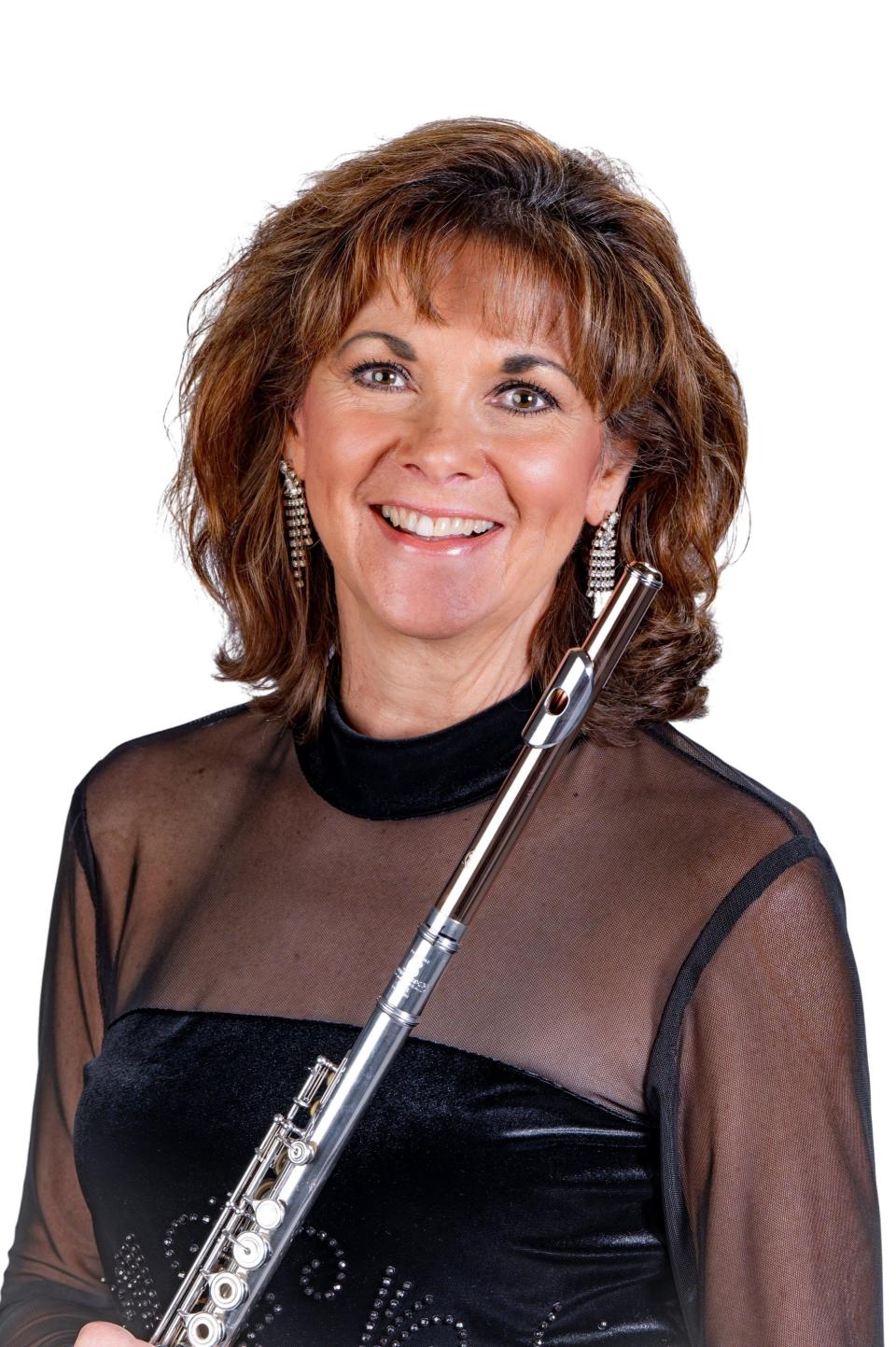 Betsy Hudson Traba, principal flute for the Sarasota Orchestra, performs with Choral Artists of Sarasota's “A Christmas Celebration.”