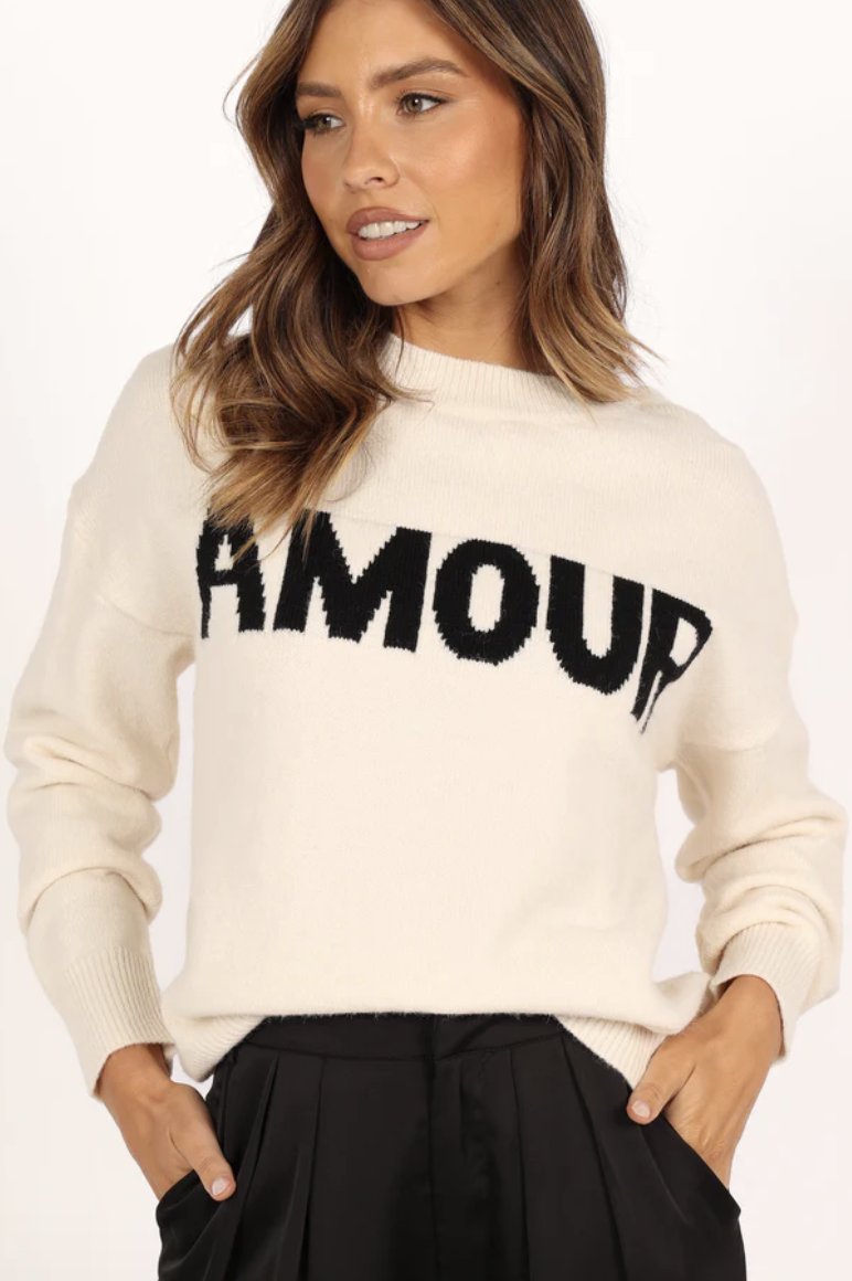 Model in Petal & Pup Amour Knit Sweater