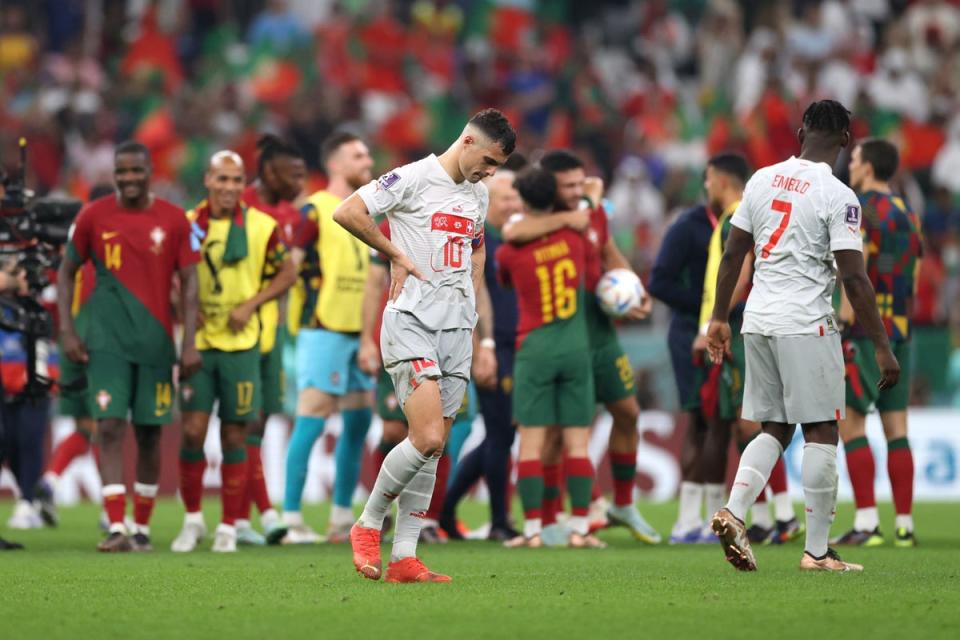 Granit Xhaka of Switzerland looks dejected after their sides’ elimination from the World Cup (Getty Images)