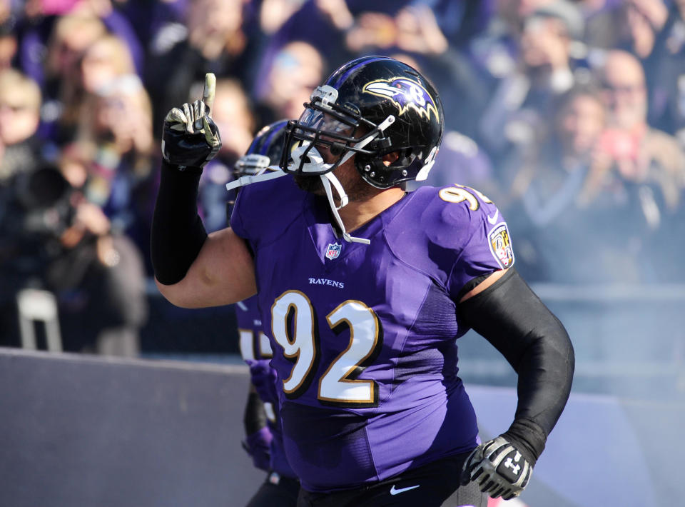 Nov 10, 2013; Baltimore, MD, USA; Baltimore Ravens defensive tackle Haloti Ngata (92) runs onto the field prior to the game against the Cincinnati Bengals at M&T Bank Stadium. Mandatory Credit: Evan Habeeb-USA TODAY Sports