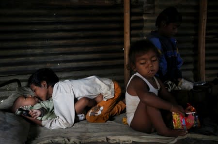 The Wider Image: The Indian children who take a train to collect water