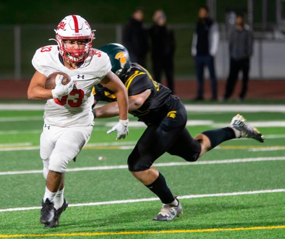 Isaac Vizcarra, 33, outruns Davis High’s defense during the first half of play during a WAC game against Davis High on Friday Oct. 27, 2023.