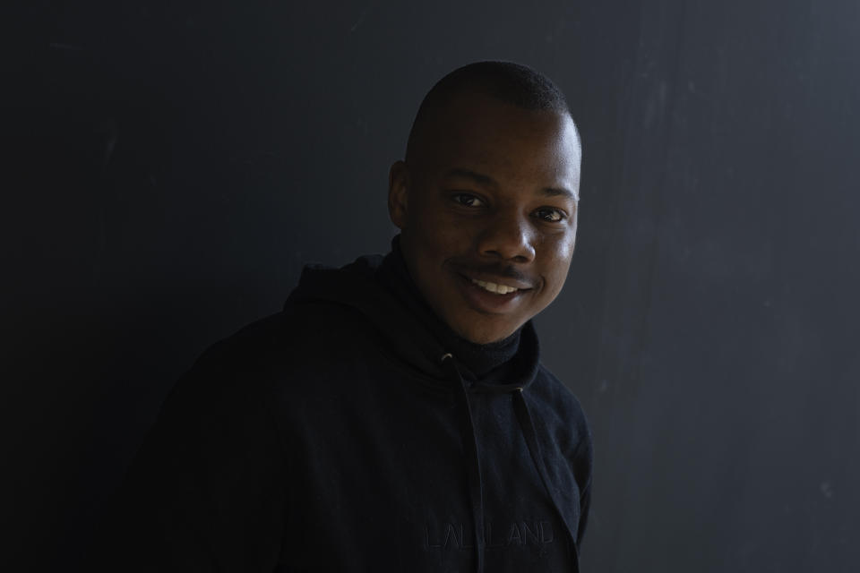 Michael Musandu, a co-founder and CEO of AI fashion company Lalaland.ai, poses for a portrait in Amsterdam, Netherlands, Friday, March 8, 2024. In March 2023, iconic denim brand Levi Strauss & Co. announced that it would be testing AI-generated models produced by the Amsterdam-based company to add a wider range of body types and underrepresented demographics on its website. (AP Photo/Peter Dejong)