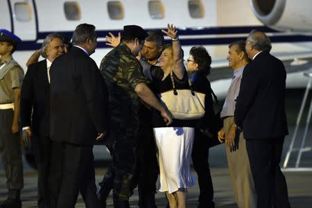 Dimitris Kouklatzis, one of the two Greek soldiers who were detained in Turkey after crossing the border, is welcomed by his mother after being released, at the airport of Thessaloniki, Greece, August 15, 2018. REUTERS/Alexandros Avramidis