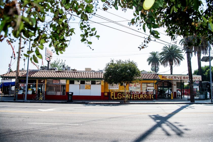 LOS ANGELES , CA - OCTOBER 06: The street view of El Gran Burrito on Tuesday, Oct. 6, 2020 in Los Angeles , CA. After 30 years in business, owner Pedro Davila will be closing the doors due in part to the Covid-19 pandemic, but moreover, his landlords sale of the lot and subsequent tear down of the building. (Mariah Tauger / Los Angeles Times)