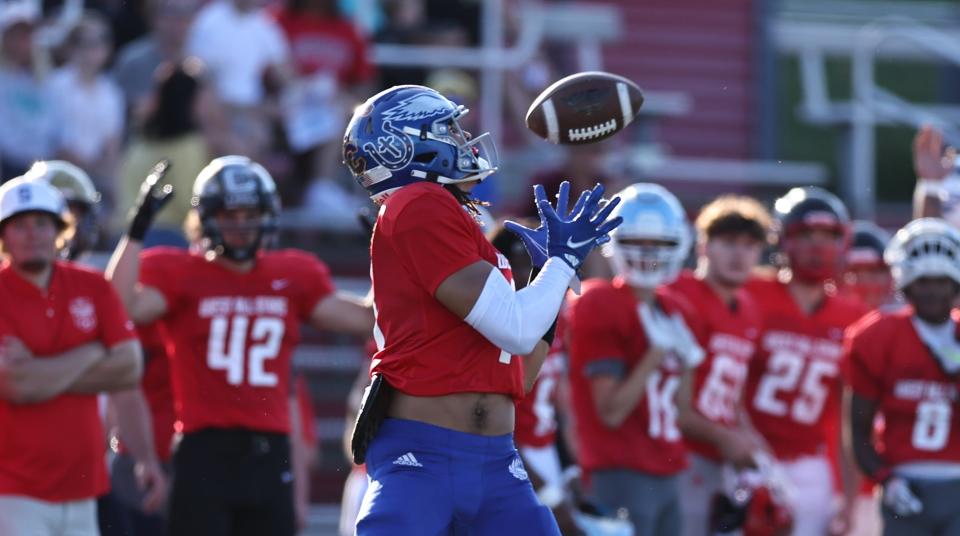 West wide receiver Cameron Patterson (17) catches a pass during the East vs. West All-Star football game at Dixie Heights High School, Thursday, June 9, 2022.