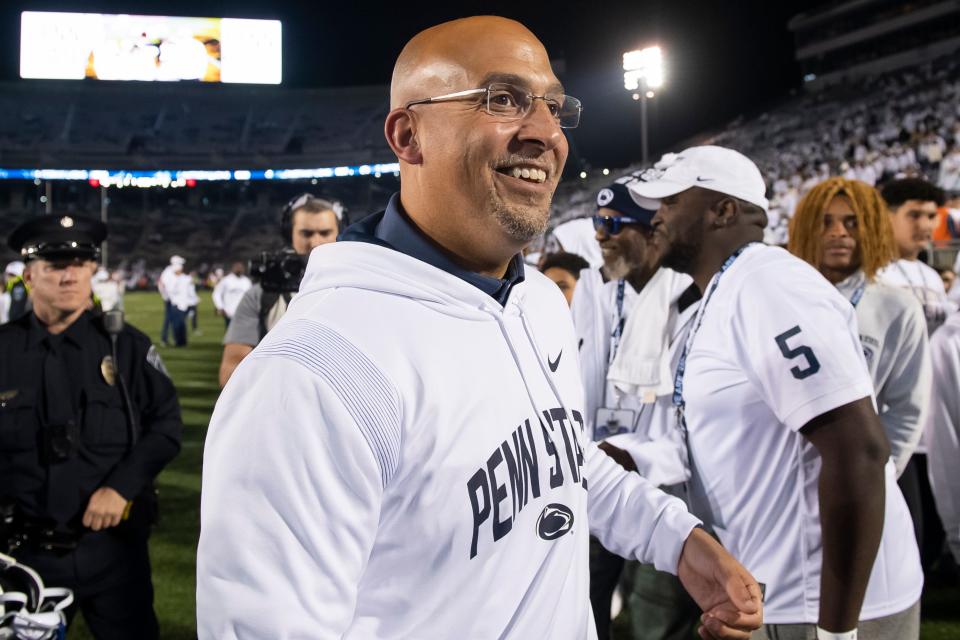 Penn State head coach James Franklin smiles as he greets supporters following the Nittany Lion's 45-17 win over Minnesota at Beaver Stadium on Saturday, Oct. 22, 2022, in State College.