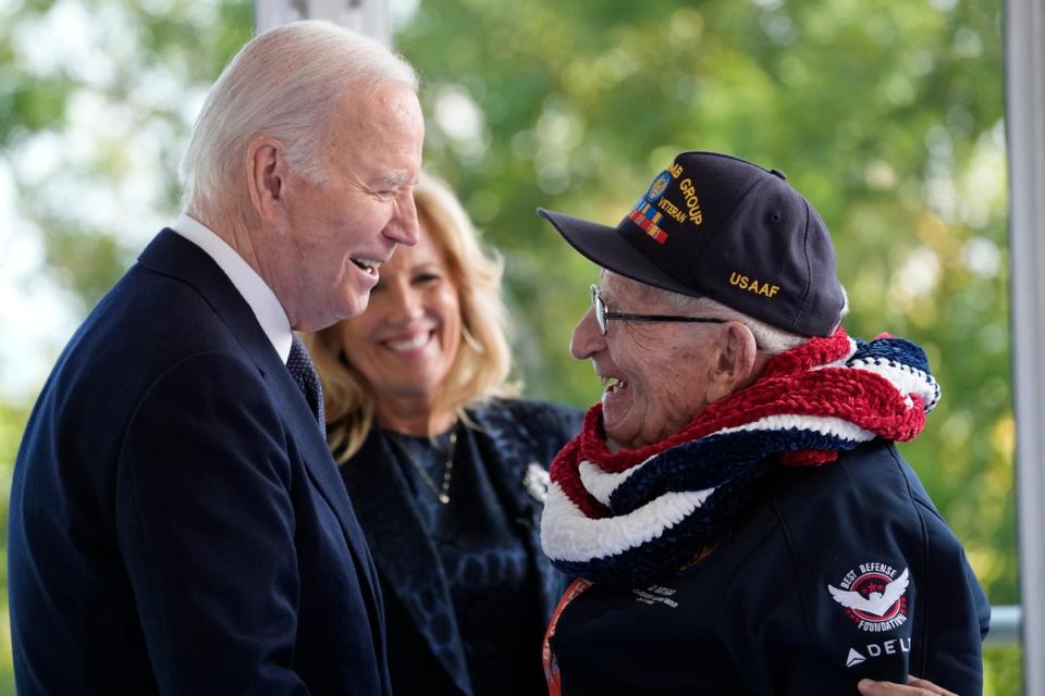 President Joe Biden and first lady Jill Biden, greet a World War II veteran during ceremonies to mark the 80th anniversary of D-Day, Thursday, June 6, 2024, in Normandy (AP)