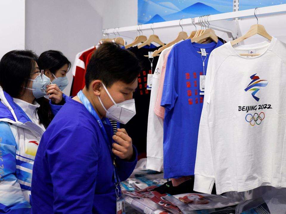A T-shirt with the logo of the Beijing 2022 Winter Olympics is displayed at a souvenir shop at the Main Press Centre ahead of the Beijing 2022 Winter Olympics, in Beijing, China January 26, 2022. Picture taken January 26, 2022.