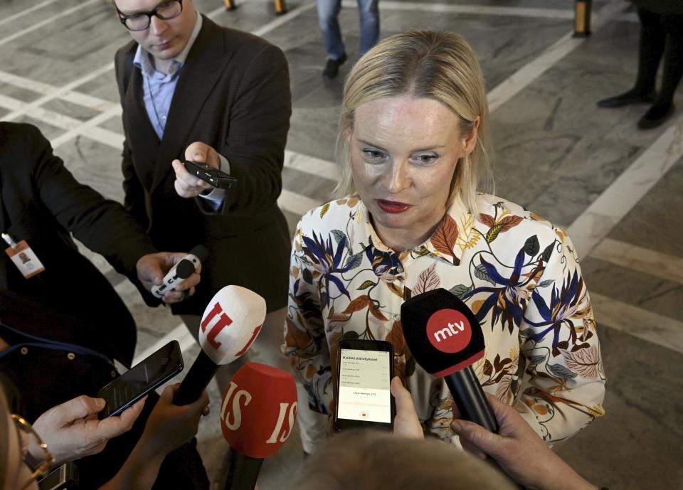 Finnish minister of finance Riikka Purra meets the media after his government's non-confidence vote at the Parliament of Finland in Helsinki on Friday, Sept. 8, 2023. (Vesa Moilanen/Lehtikuva via AP)