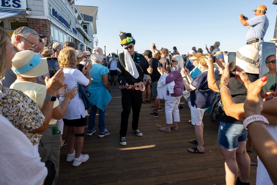 “Mourners” gathered to celebrate the summer of 2024 at the annual Bethany Beach Jazz Funeral on the Bethany Beach Boardwalk on Labor Day, Monday.