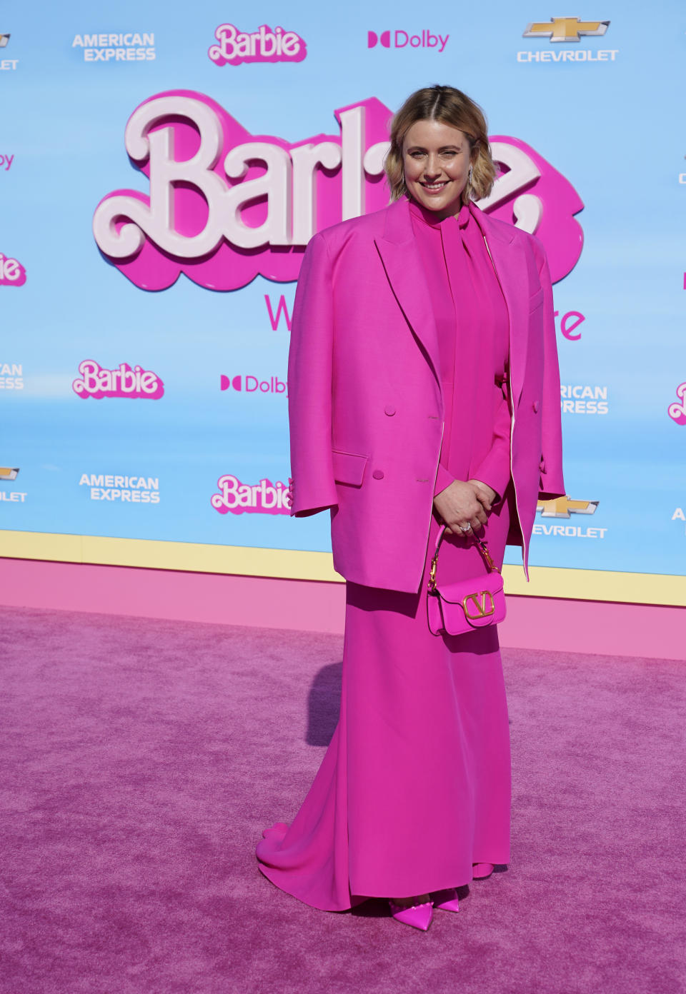 Writer/director/executive producer Greta Gerwig arrives at the premiere of "Barbie" on Sunday, July 9, 2023, at The Shrine Auditorium in Los Angeles. (AP Photo/Chris Pizzello)