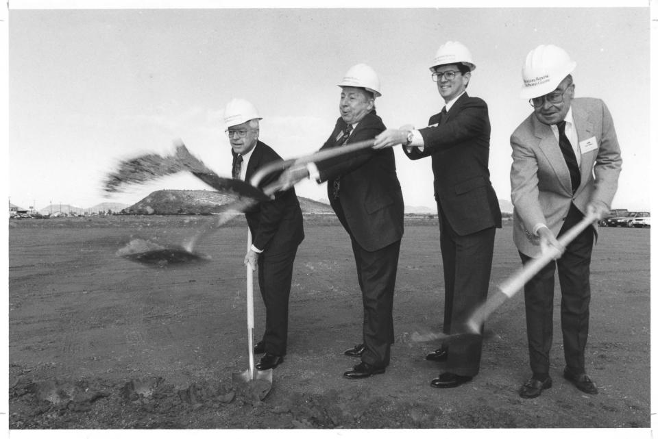 Phoenix Newspapers Inc. broke ground at its new Republic & Gazette printing plant in Deer Valley on March 12, 1990. Pictured from left to right are Bill Hogan, Frank Russell, John Zanotti and Eugene Pulliam.