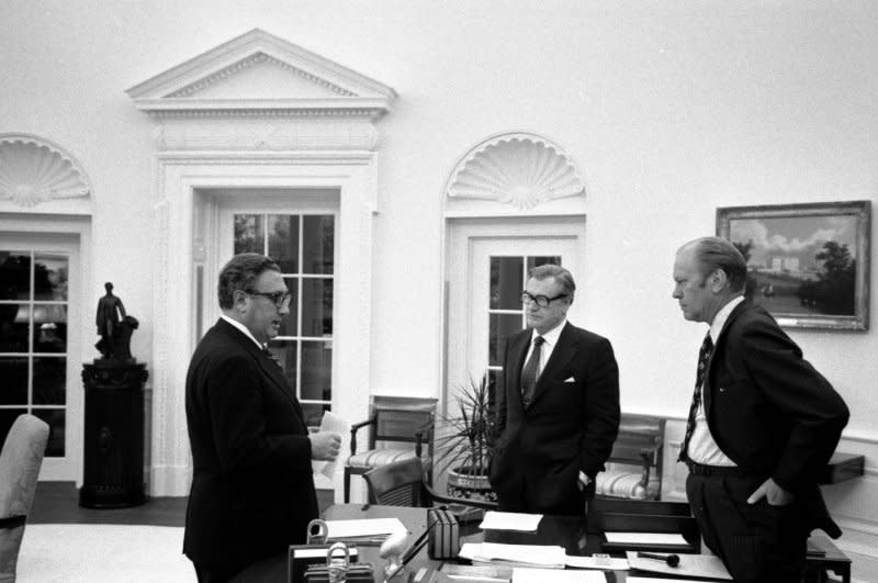 President Gerald Ford (R), shown in a April 28, 1975 file photo meeting with Secretary Henry Kissinger (L) and Vice President Nelson Rockefeller in the Oval Office. Kissinger died Wednesday at the age of 100. File photo by David Hume Kennerly/UPI Photo/Gerald R. Ford Library