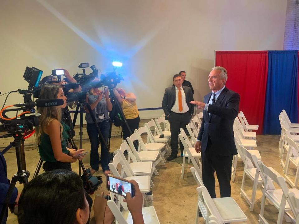 Democratic presidential candidate Robert Kennedy Jr. speaks to reporters before a town hall event in Greenville, S.C. Monday, Aug. 21, 2023.