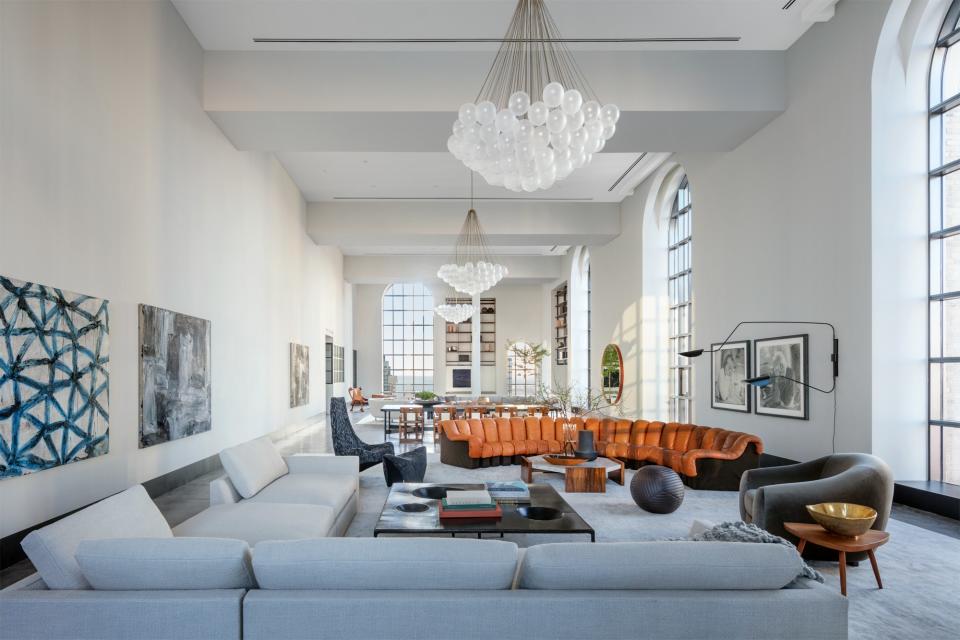 "The penthouse of One Hundred Barclay is quintessential ‘downtown,’ and the space itself is so grand in terms of size and in terms of history, it was a natural choice to use furnishings that have an edge but still have that feel of being perfectly timeless," explains the designer. Large-scale art also makes use of the immense amount of wall space.