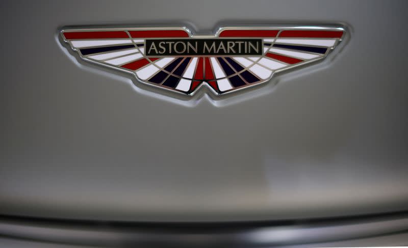 The Aston Martin logo is seen on a V12 Vantage car at the company’s factory in Gaydon