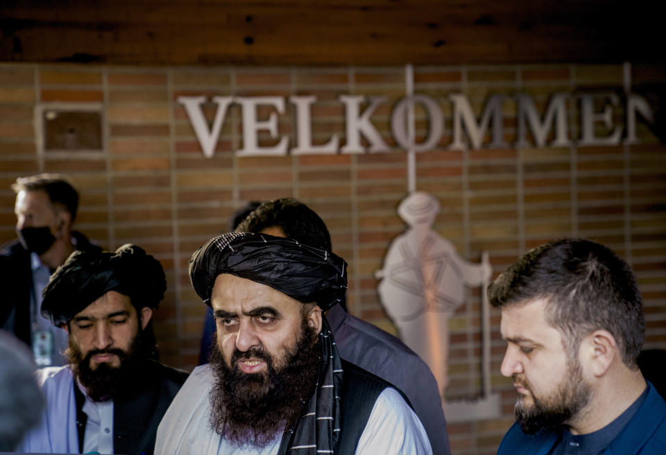 Afghan Foreign Minister Amir Khan Muttaqi meets the media outside the Soria Moria hotel in Oslo, Norway, Monday, Jan. 24, 2022. The Taliban and western diplomats have began their first official talks in Europe since they took over control of Afghanistan in August. The closed-door meetings were taking place at a hotel in the snow-capped mountains above the Norwegian capital and Taliban representatives will be certain to press their demand that nearly $10 billion frozen by the United States and other Western countries be released as Afghanistan faces a precarious humanitarian situation. (Stian Lysberg Solum/NTB scanpix via AP)