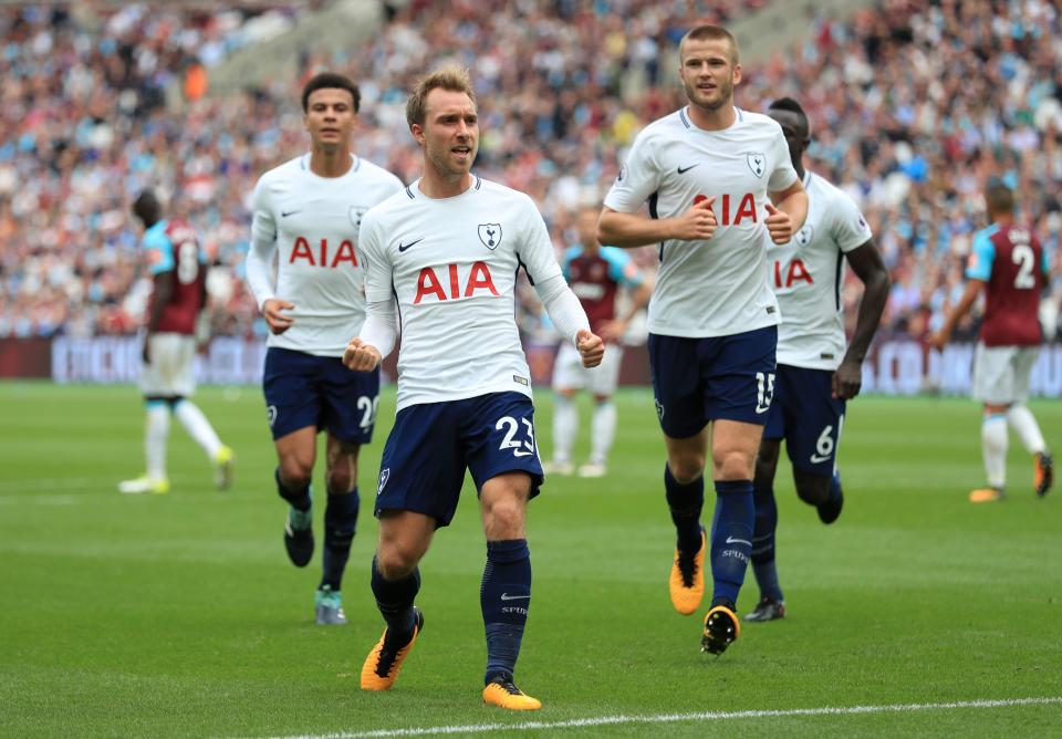 Tottenham’s Christian Eriksen (centre) celebrates scoring his side’s third goal of the game against West Ham