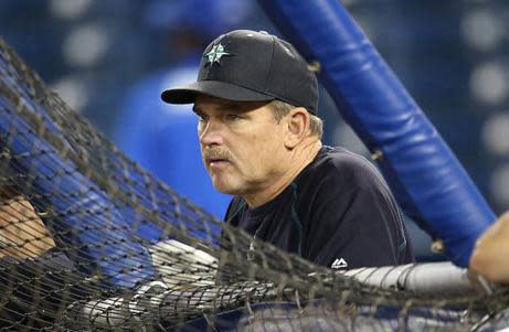 Rangers coach Howard Johnson was injured when a foul ball struck his face during the team’s final spring training game. (Getty Images)