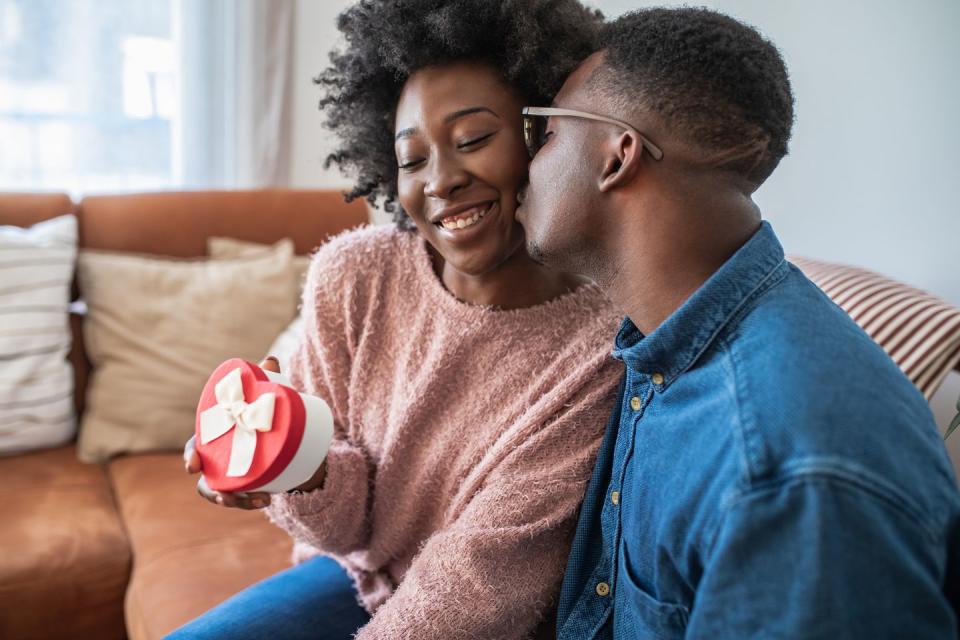 portrait of romantic african american couple celebrating love