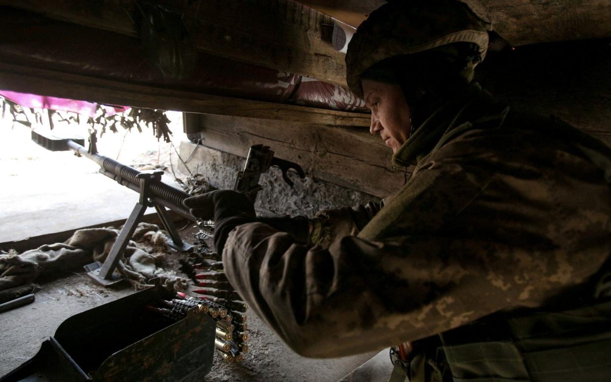 A Ukrainian serviceman on the front line in Donetsk region on February 19, 2021. - Anatolii Stepanov/AFP