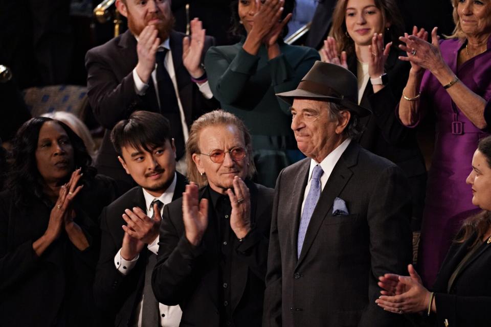 Paul Pelosi, husband of Representative Nancy Pelosi, a Democrat from California, center right, is recognized