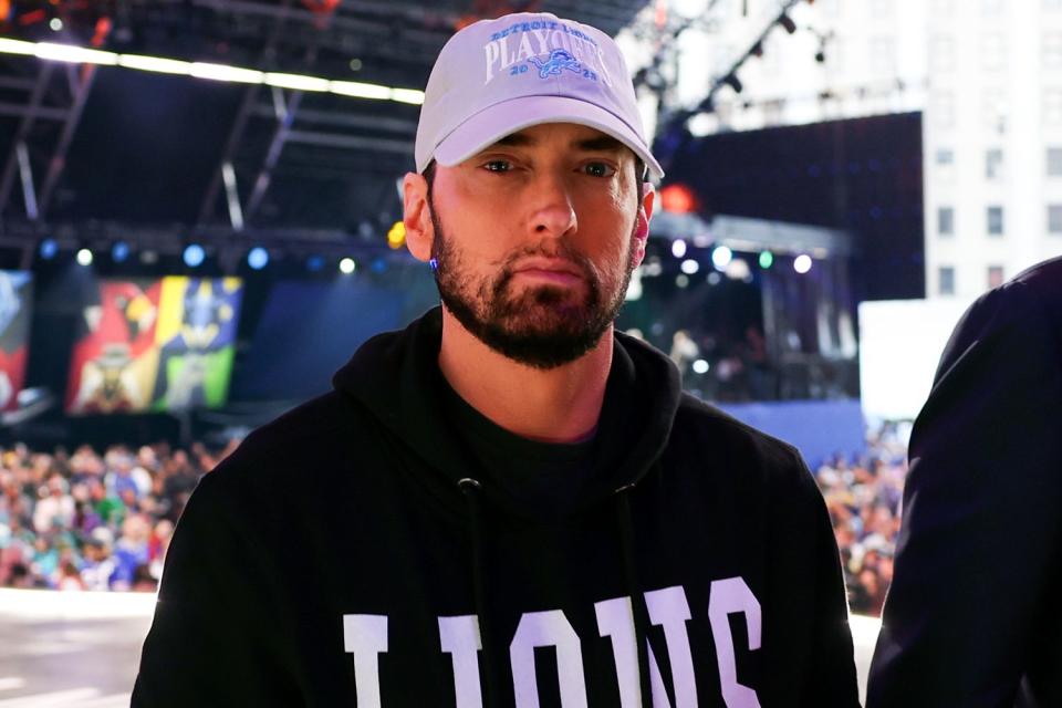 <p>Ben Liebenberg / AP</p> Eminem at the NFL Draft in Detroit in April 2024