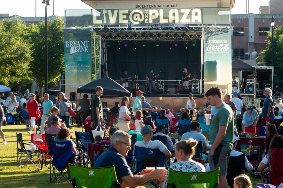 The Tuscaloosa community enjoys the first Live at the Plaza concert of the season at Government Plaza on June 3, 2022, listening to the music of The Locals.