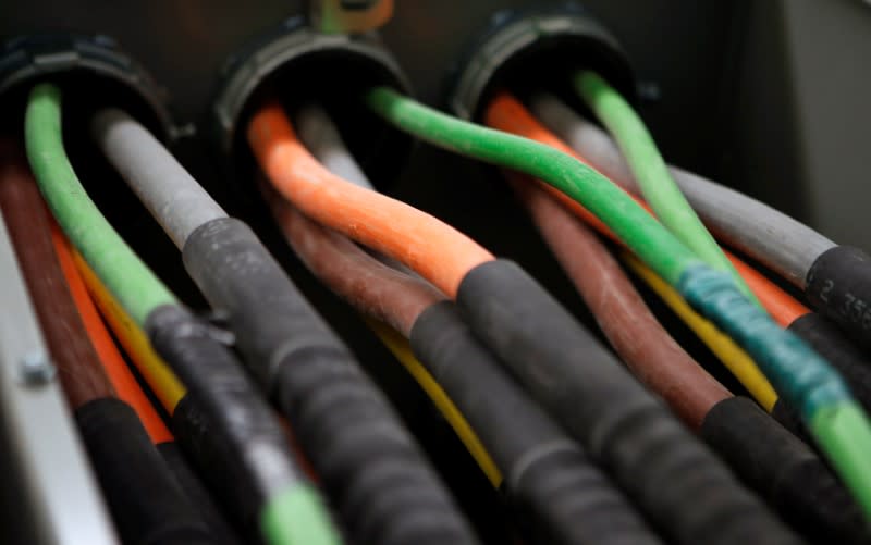 FILE PHOTO: Fiber optic cables carrying internet providers are seen running into a server room at Intergate.Manhattan, a data center owned and developed by Sabey Data Center Properties, during a tour of the facility in lower Manhattan, in New York