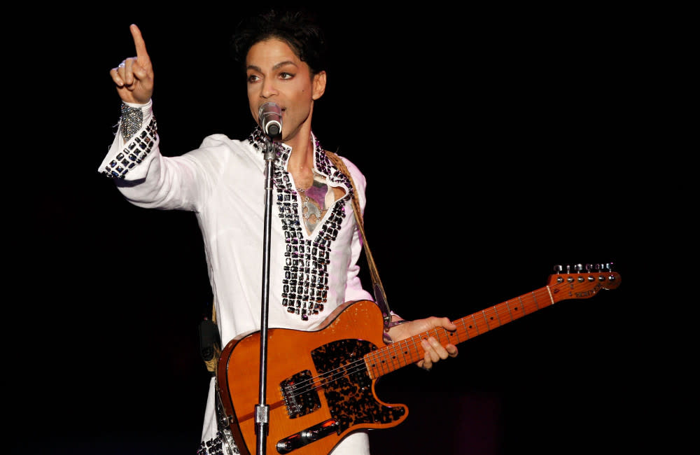 Prince wearing a Tony Burch tunic at Coachella 2008 credit:Bang Showbiz