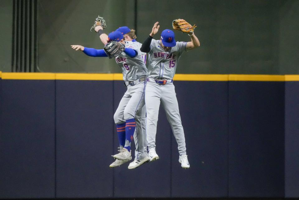 The chaotic travel hasn't seemed to faze these Mets. (AP foto/Morry Gash)