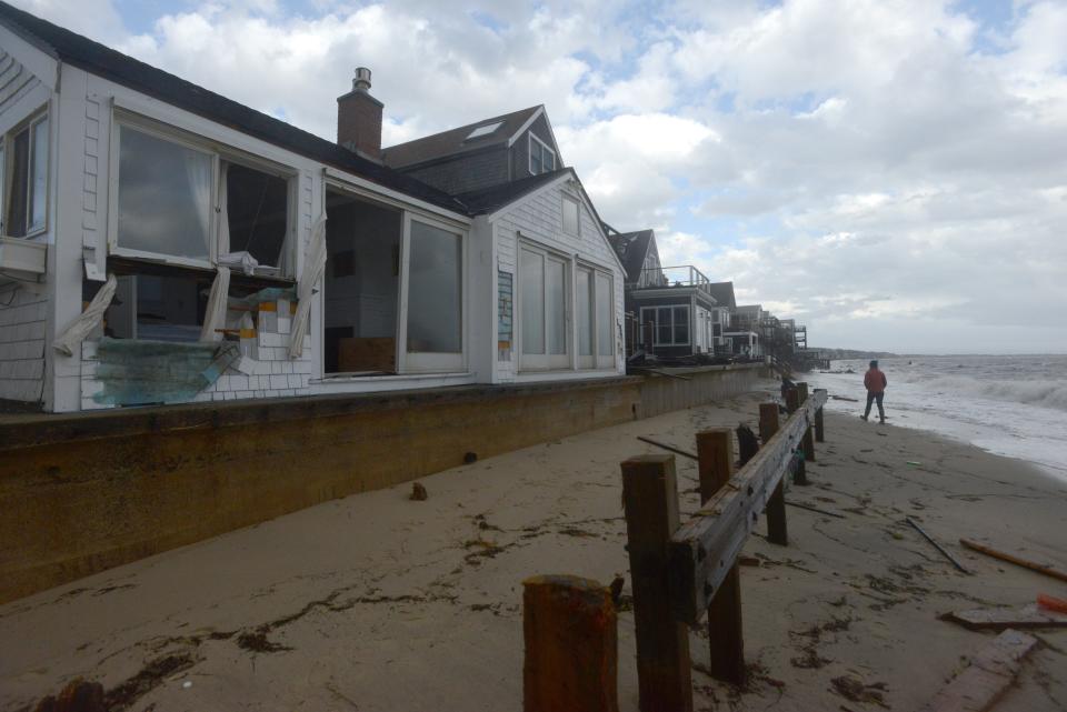 The Sea Urchin cottage lost its deck and a slider opening into a bedroom in the east end of Provincetown on Friday. The east end of the town was hit hard by the morning high tide and high winds.