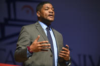 In this Saturday, Jan. 25, 2020, photo, former Baltimore Police Spokesman T.J. Smith answers a question during a Baltimore City Mayoral Candidate Forum, hosted by the Greater Baltimore Urban League, at Morgan State University, in Baltimore. (Ulysses Muñoz/The Baltimore Sun via AP)