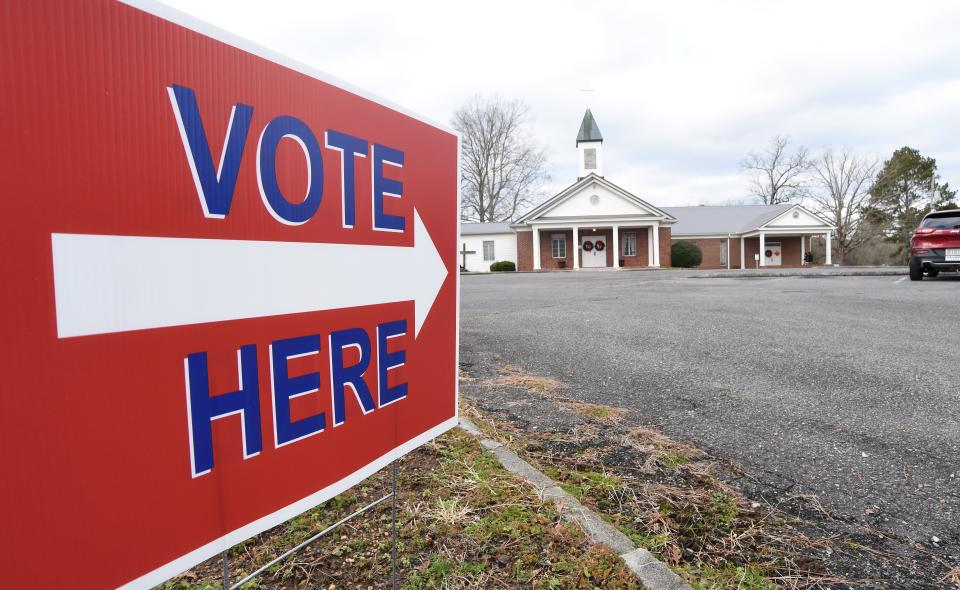 A sign at the street points voters to a polling place at Dawnville United Methodist Church in Dawnville, Ga., on Tuesday, Jan. 5, 2021. (Matt Hamilton/Chattanooga Times Free Press via AP)