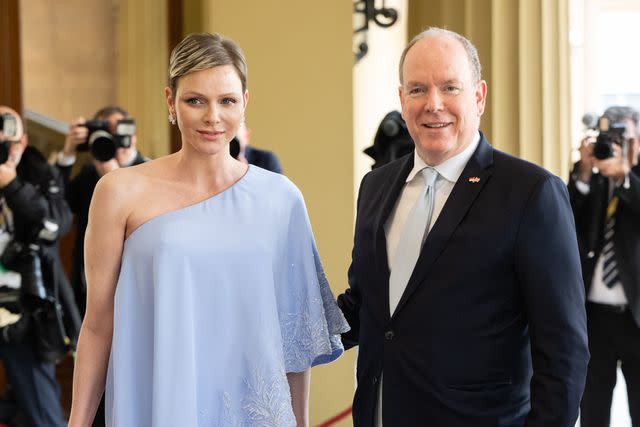 <p>Samir Hussein/WireImage</p> Princess Charlene and Prince Albert of Monaco in May 2023