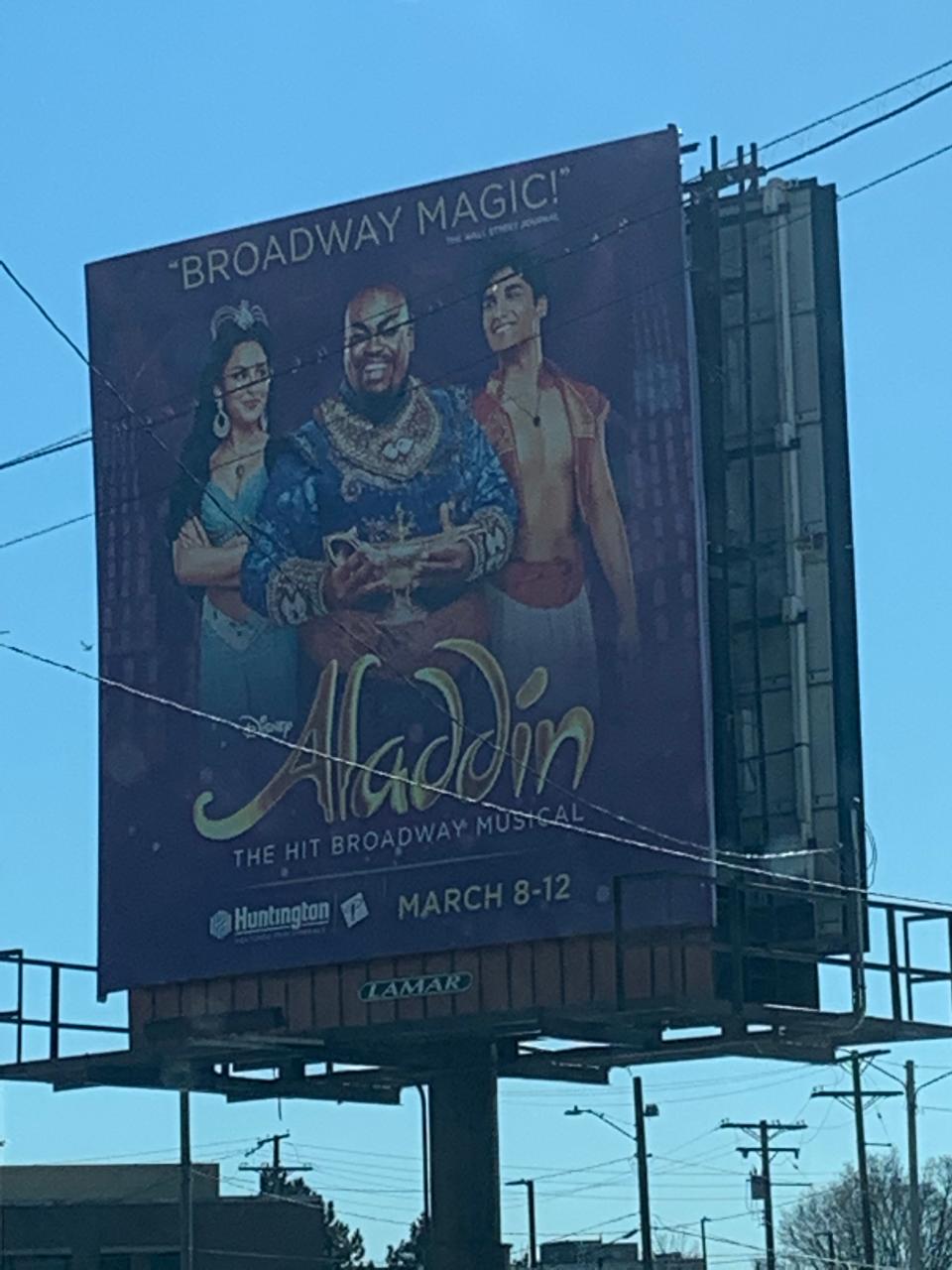 Marcus Martin is pictured as Genie on a billboard with his "Aladdin" co-stars near Playhouse Square in Cleveland.