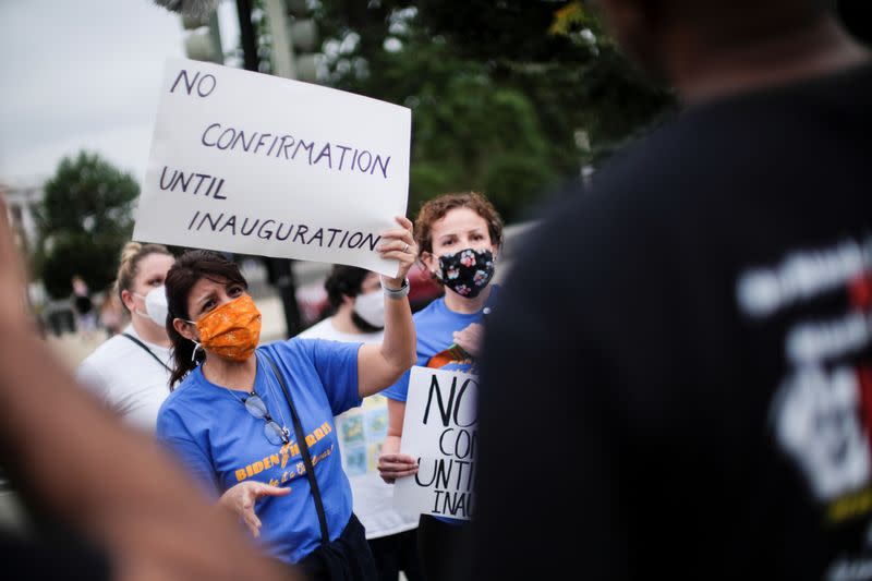 Protestors demonstrate outside the U.S. Supreme Court after U.S President Donald Trump announced U.S. Court of Appeals Judge Amy Coney Barrett as his nominee to fill the Supreme Court seat left vacant by the death of Justice Ruth Bader Ginsburg