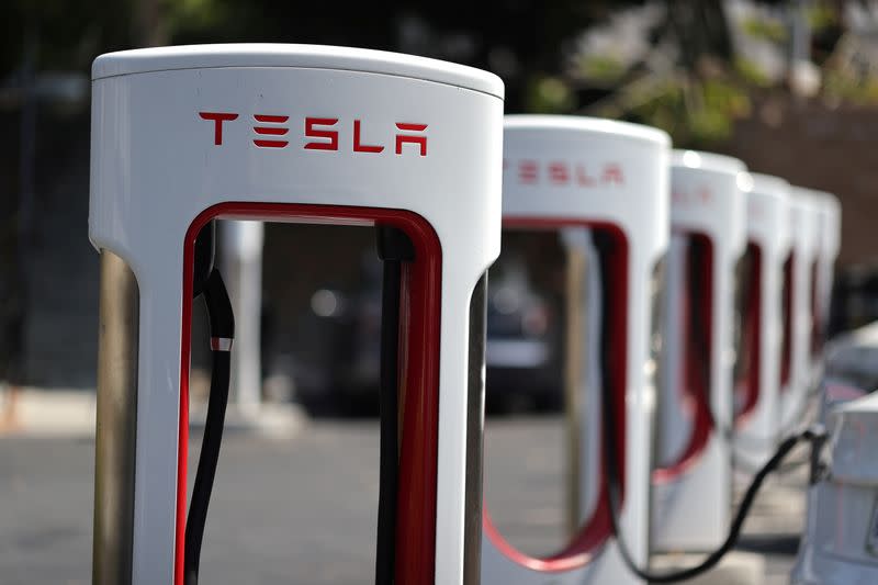 FILE PHOTO: A Tesla SuperCharger station is seen in Los Angeles