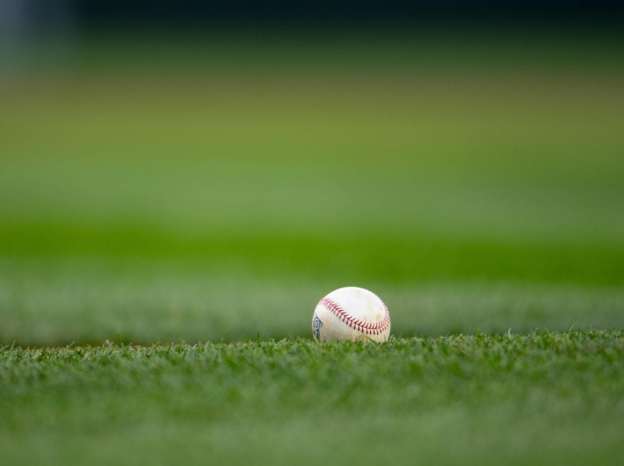 SEATTLE, WA - APRIL 14:  A detail shot of a baseball on the baseline during the game between the Texas Rangers and the Seattle Mariners at Safeco Field on Friday, April 14, 2017 in Seattle, Washington. (Photo by Rod Mar/MLB Photos via Getty Images) 