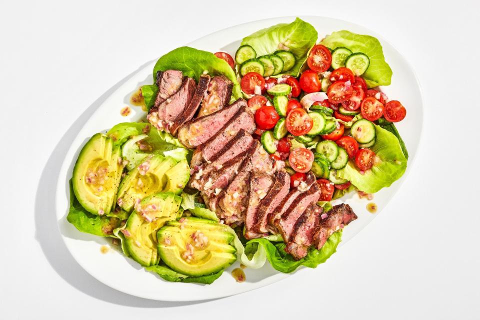<p>Cook your steak to perfection in a cast-iron skillet, or throw it on the grill for a touch of smoke. Either way, the fresh veggies and homemade shallot dressing will pair perfectly.</p> <p>Get the recipe <a href="https://www.bonappetit.com/recipe/steak-salad-with-shallot-vinaigrette?mbid=synd_yahoo_rss" rel="nofollow noopener" target="_blank" data-ylk="slk:here" class="link ">here</a>.</p>
