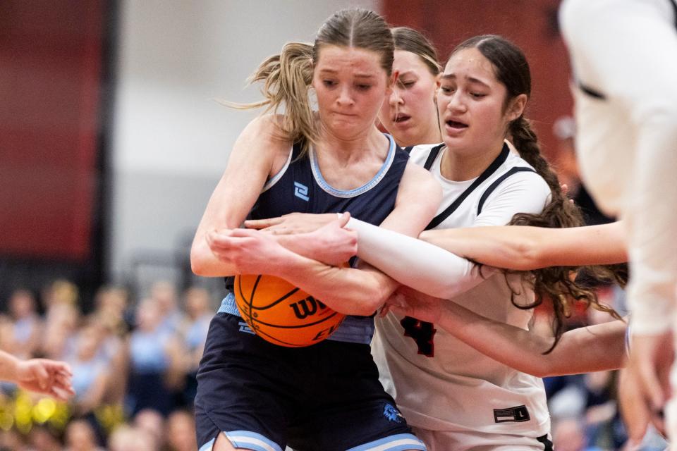 Salem Hills Skyhawks’ Brooke Warren (23) fights for the ball against West Panthers guard/forward Kaydence Falatea (4) during a game at West High School in Salt Lake City on Thursday, Feb. 22, 2024. | Marielle Scott, Deseret News