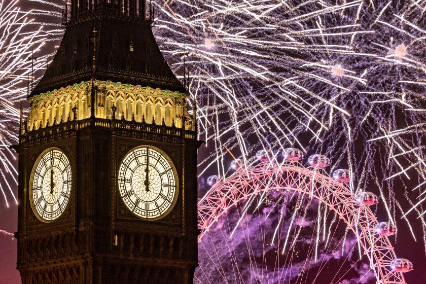 LONDON, ENGLAND - JANUARY 1: Fireworks light up the London skyline over Big Ben and the London Eye just after midnight on January 1, 2023 in London, England. London's New Years' Eve firework display returned this year after it was cancelled during the Covid Pandemic. (Photo by Dan Kitwood/Getty Images)