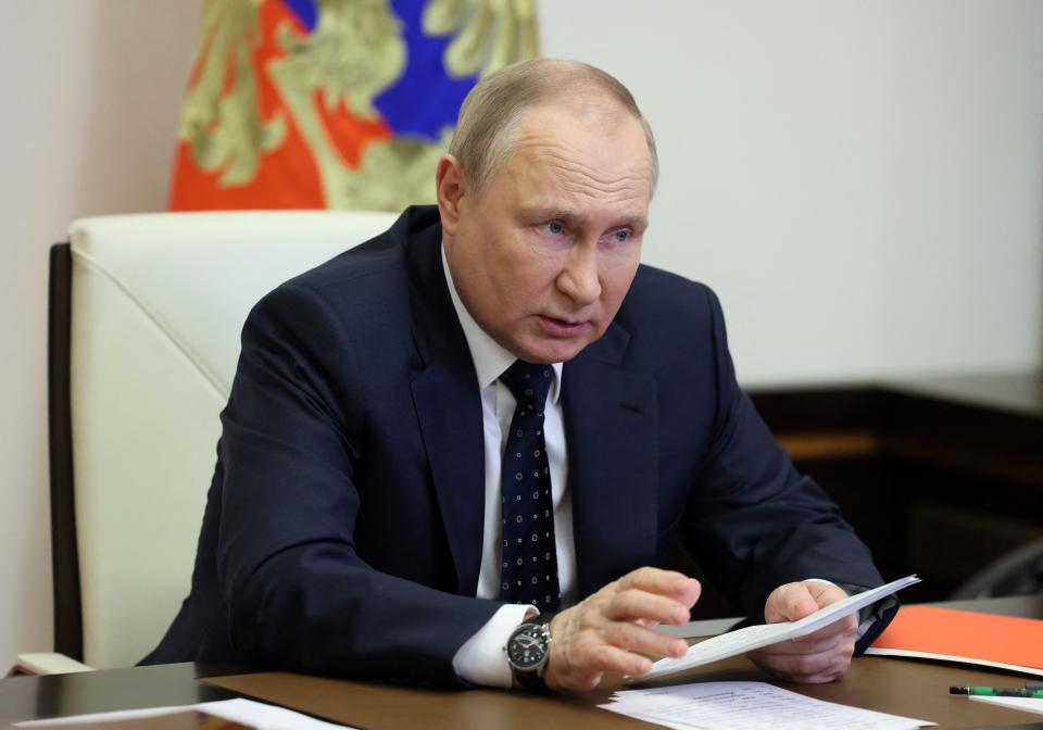 Russian President Vladimir Putin chairs a Security Council meeting via a video link at the Novo-Ogaryovo state residence outside Moscow on May 20, 2022. 