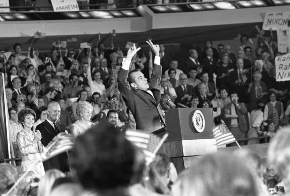 President Nixon making victory signs