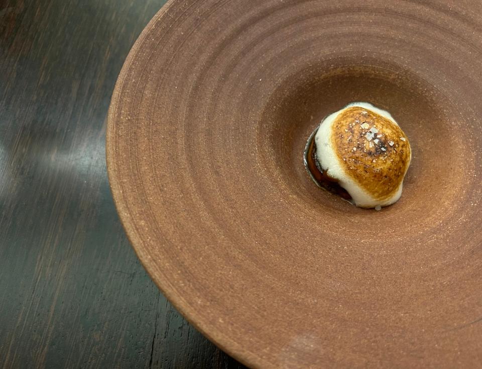 An exceptional course of nixtamilized sweet potato with torched foie gras meringue at The Catbird Seat.