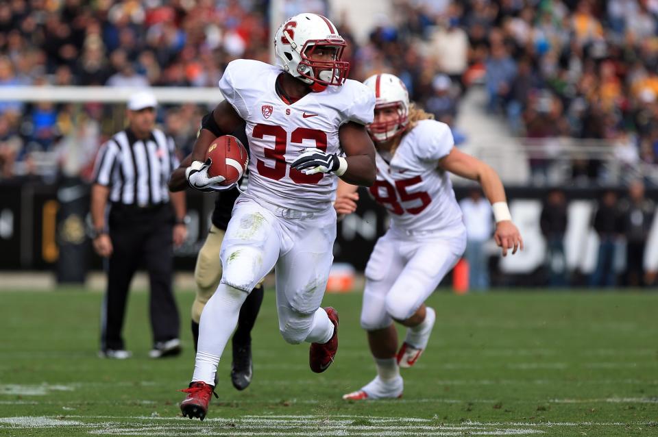Running back Stepfan Taylor #33 of the Stanford Cardinals rushes 26 yards for a touchdown against the Colorado Buffaloes in the second quarter at Folsom Field on November 3, 2012 in Boulder, Colorado. (Photo by Doug Pensinger/Getty Images)